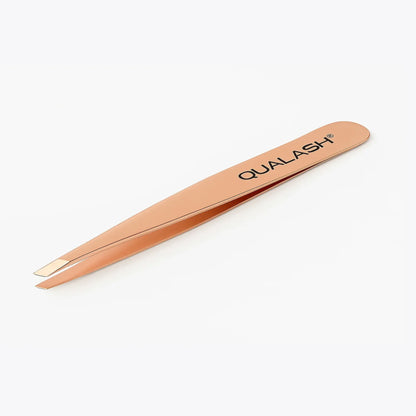 QUALASH Professional Tweezer – Close-up of slant-tip tweezer in elegant rose gold color